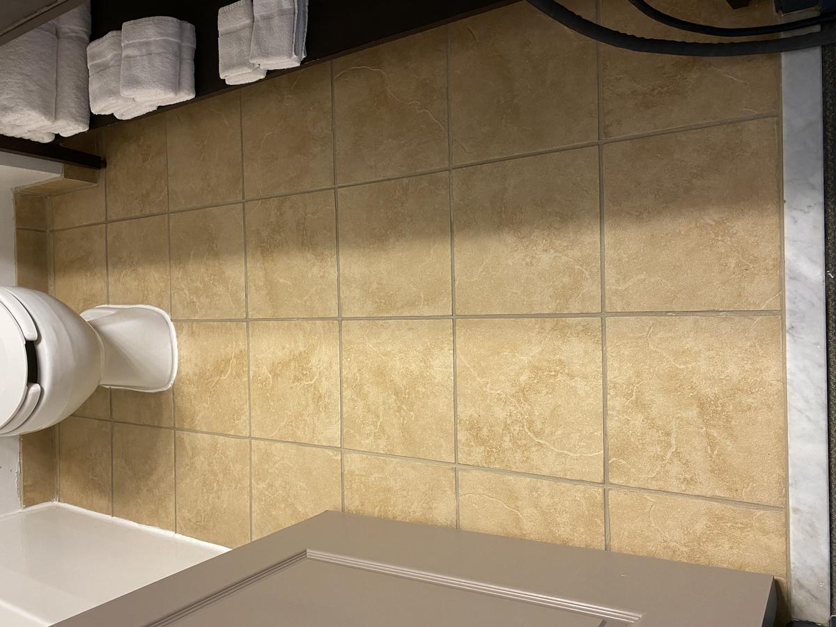Hotel bathroom tile before RF cleaning